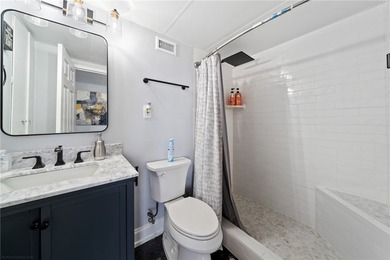 This gorgeous downtown unit at The Cliff House is a great find