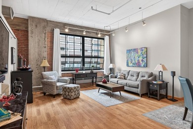 Rare 5th-floor corner loft at American Trio Lofts, filled with - photo 1