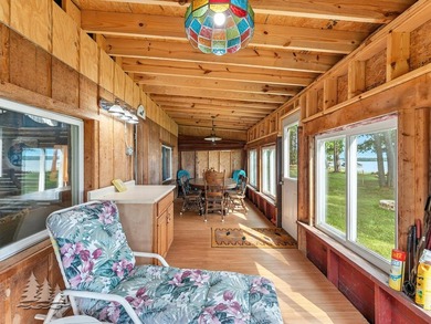 Tucked along 50 feet of coveted West Twin Lake frontage, this - photo 21