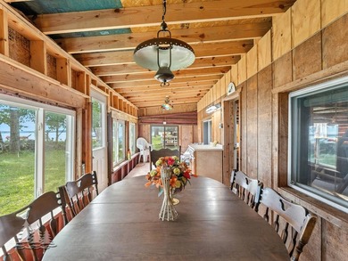 Tucked along 50 feet of coveted West Twin Lake frontage, this - photo 22