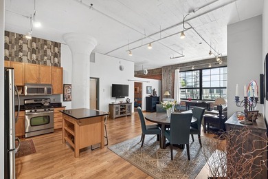 Rare 5th-floor corner loft at American Trio Lofts, filled with - photo 5