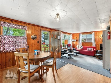 Tucked along 50 feet of coveted West Twin Lake frontage, this - photo 30