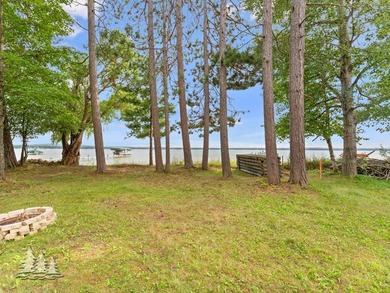 Tucked along 50 feet of coveted West Twin Lake frontage, this - photo 39