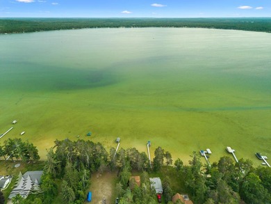 Tucked along 50 feet of coveted West Twin Lake frontage, this - photo 42
