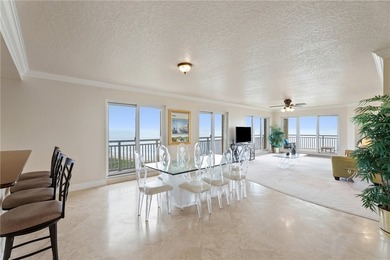 This rare NE CORNER unit features breathtaking views of both the - photo 3