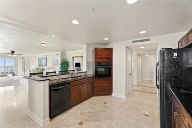 This rare NE CORNER unit features breathtaking views of both the - photo 8
