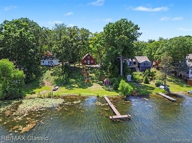 Escape to the peaceful living beauty of lake living in this - photo 27