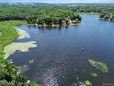 Escape to the peaceful living beauty of lake living in this - photo 28