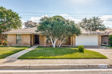 Welcome to 14714 Hidden Glen Woods an inviting 3-bedroom, 2-bath - photo 1