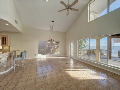 Wake up to breathtaking views of Nueces Bay from this waterfront - photo 11