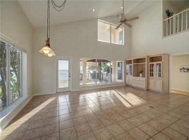 Wake up to breathtaking views of Nueces Bay from this waterfront - photo 12