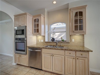 Wake up to breathtaking views of Nueces Bay from this waterfront - photo 18