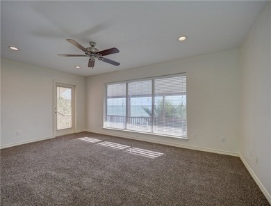Wake up to breathtaking views of Nueces Bay from this waterfront - photo 26