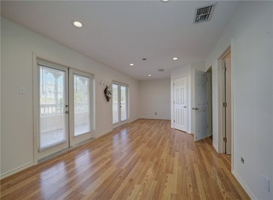 Wake up to breathtaking views of Nueces Bay from this waterfront - photo 31