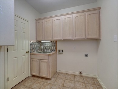 Wake up to breathtaking views of Nueces Bay from this waterfront - photo 37