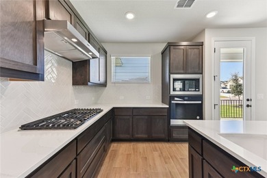Spieth plan with upgraded kitchen, quartz countertops, upgraded - photo 15