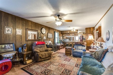 Endless potential on a beautiful corner lot! This fixer-upper