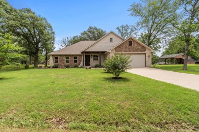 Quality of craftsmanship shows in this beautiful custom home on - Lake Home For Sale in Enchanted Oaks, Texas