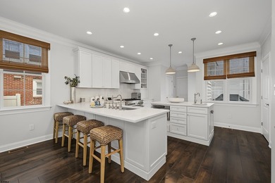 JUST FOUR HOMES FROM THE BEACH! Welcome to one of the most - photo 18