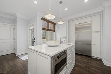JUST FOUR HOMES FROM THE BEACH! Welcome to one of the most - photo 23