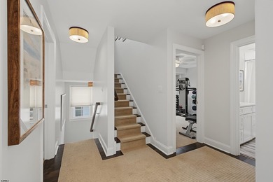 JUST FOUR HOMES FROM THE BEACH! Welcome to one of the most - photo 25