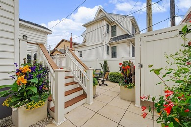 JUST FOUR HOMES FROM THE BEACH! Welcome to one of the most - photo 50