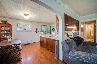Welcome home to this charming 4-bedroom bungalow, where comfort - photo 3
