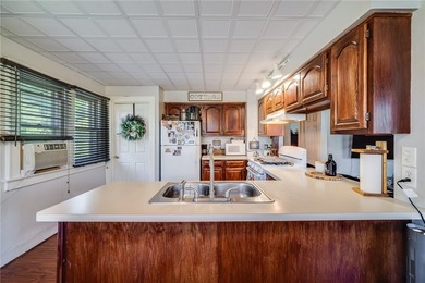 Welcome home to this charming 4-bedroom bungalow, where comfort - photo 4