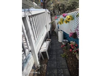 Nicely remodeled home featuring mature trees, a spacious deck