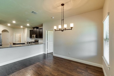 Step through the front door and into a bright flex space framed - photo 14