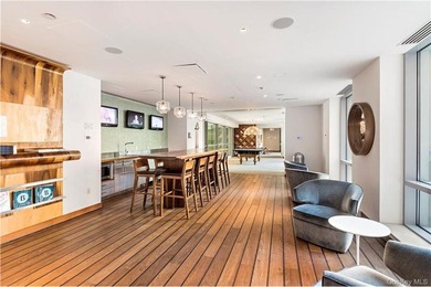 Welcome home to Residence 4M at Riverhouse. This sun-filled 1 - photo 11