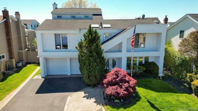 Experience the pinnacle of waterfront living at this spectacular - photo 1