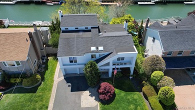 Experience the pinnacle of waterfront living at this spectacular - photo 3