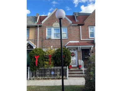 Welcome to this charming three-bedroom duplex located in an - photo 1