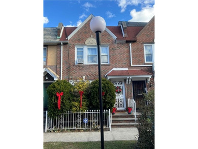 Welcome to this charming three-bedroom duplex located in an - photo 3