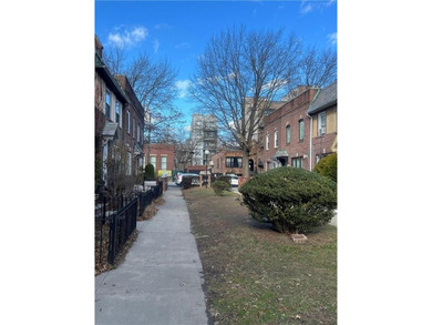 Welcome to this charming three-bedroom duplex located in an - photo 6