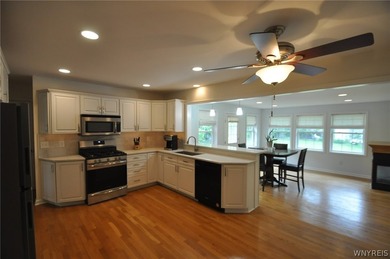 Set on a deep, beautifully proportioned lot in one of Amherst's - photo 9