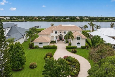 Recently updated riverfront estate featuring 5BR/4.5BA in the - photo 1