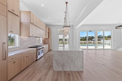 The Darien III by Romair is a custom residence with a detached - photo 14