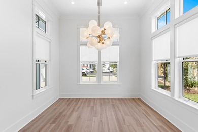 The Darien III by Romair is a custom residence with a detached - photo 15