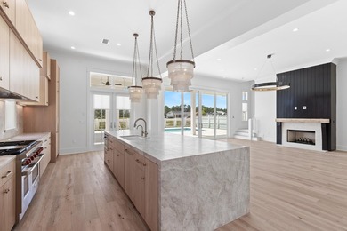 The Darien III by Romair is a custom residence with a detached - photo 17