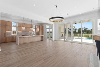 The Darien III by Romair is a custom residence with a detached - photo 18