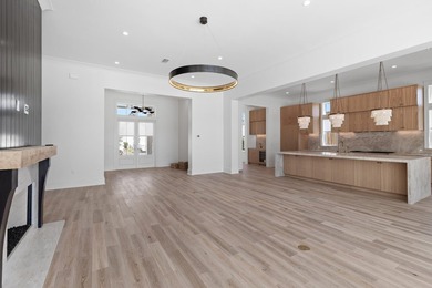 The Darien III by Romair is a custom residence with a detached - photo 19
