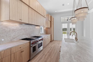 The Darien III by Romair is a custom residence with a detached - photo 20