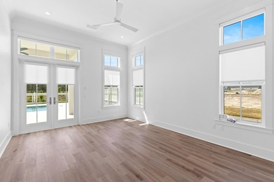 The Darien III by Romair is a custom residence with a detached - photo 24