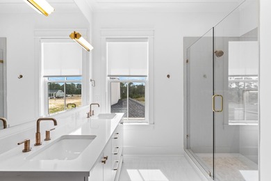 The Darien III by Romair is a custom residence with a detached - photo 33