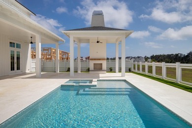 The Darien III by Romair is a custom residence with a detached - photo 37