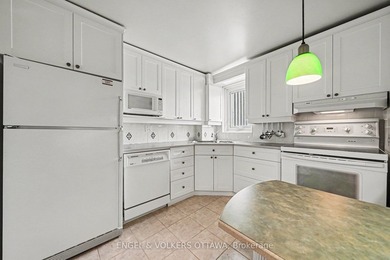Welcome to this spacious and well-maintained 2-bedroom end-unit - photo 16