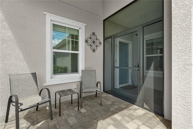 Welcome to Windward at Lakewood Ranch, a gated resort-style - photo 3