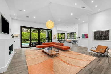 A single-story masterpiece unfolds in the prestigious Royal Palm - photo 11
